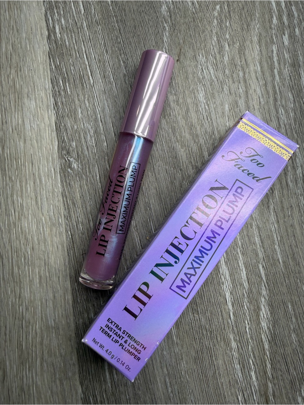 Too Faced Lip Injection Maximum Plump Lip Gloss in “Blueberry Buzz”
